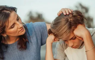 Parent talking to child about self-harming