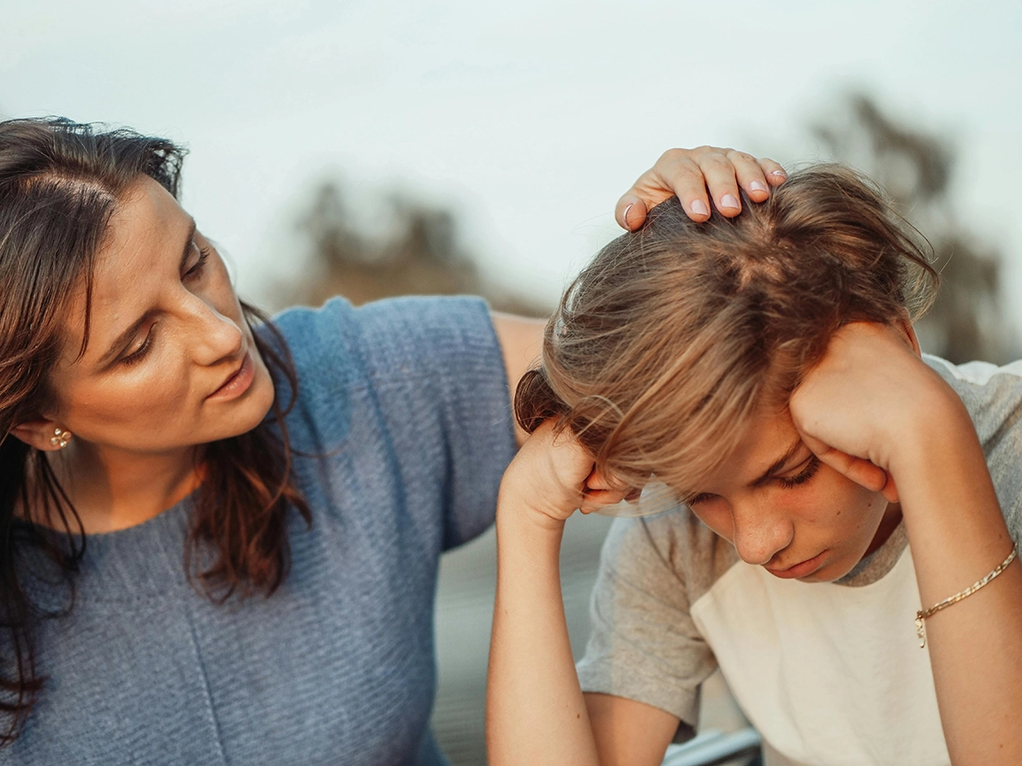 Parent talking to child about self-harming