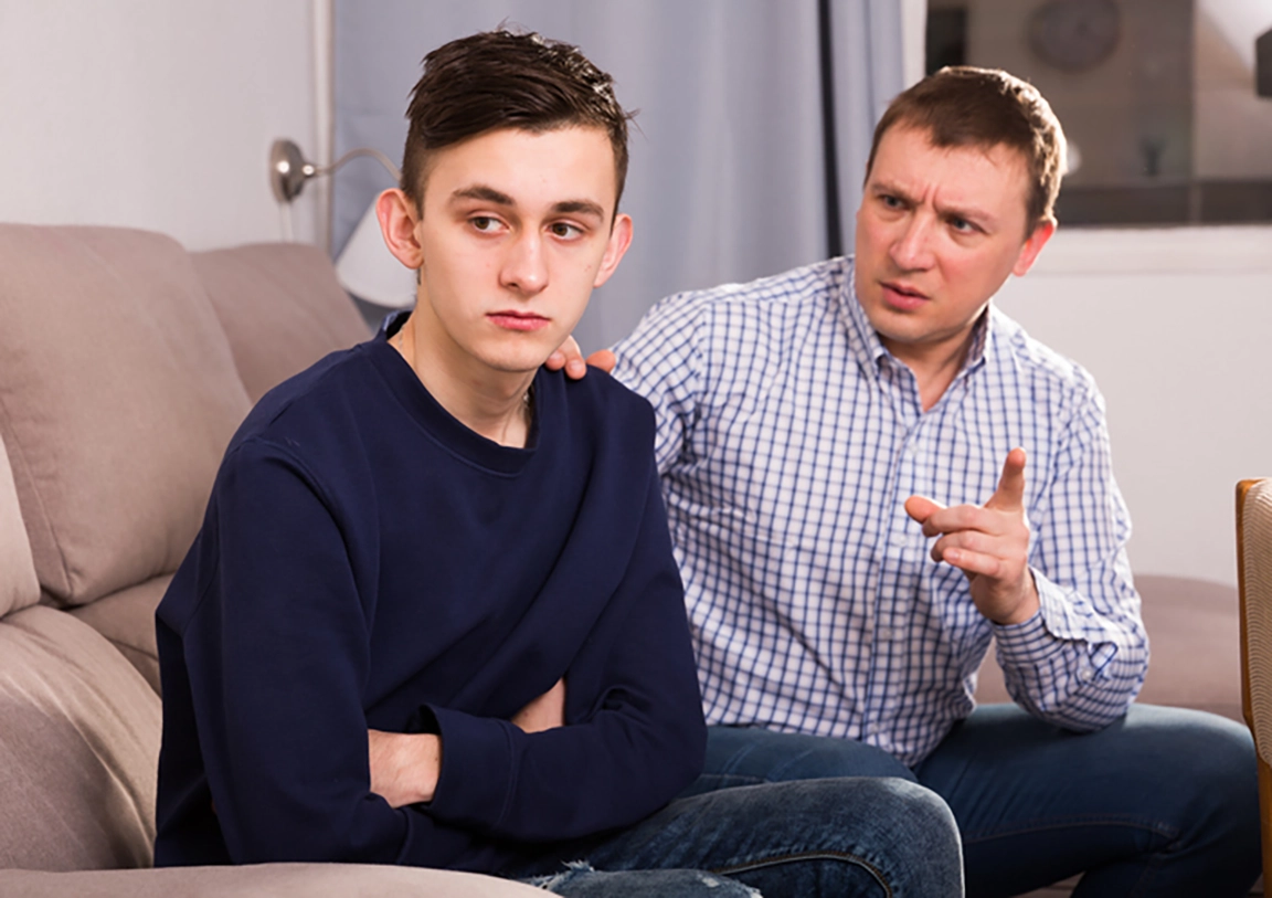 Teen being aggressive with parent