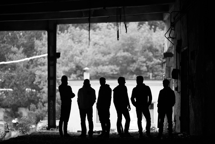 A group of out of control teenage boys gathers bent on trouble