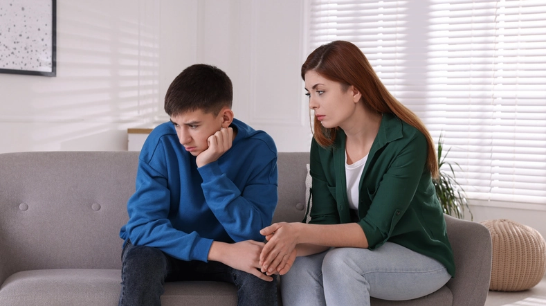 A mom tries to discuss important issues with her special needs teenage son